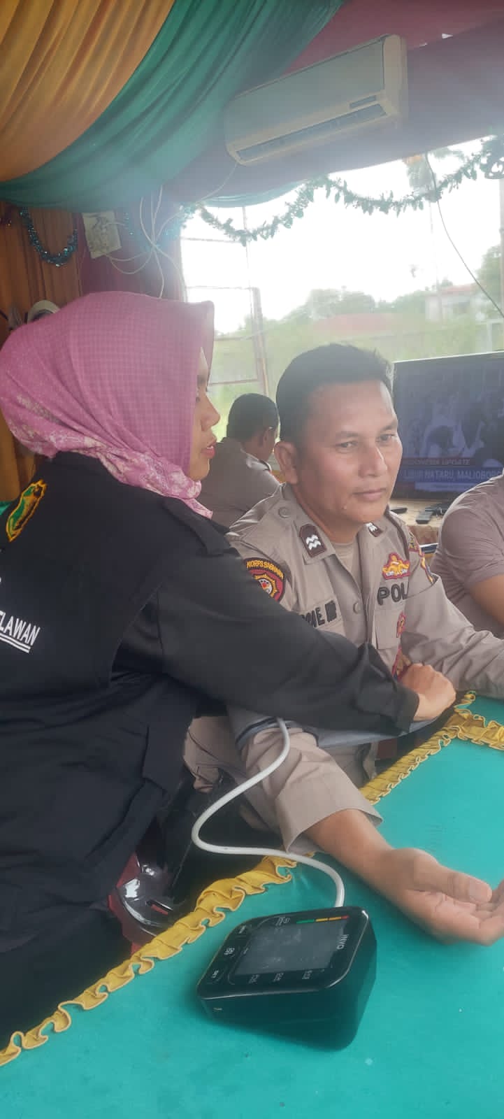 Si Dokkes Polres Pelabuhan Belawan Berikan Pelayanan Kesehatan kepada Personel Pos Pam Ops Lilin Toba 2025
