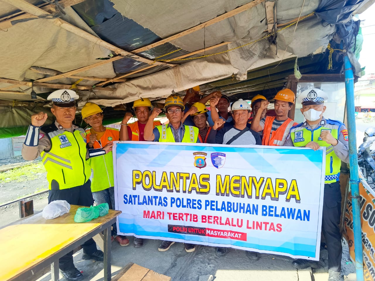 Sat Lantas Polres Pelabuhan Belawan Berikan Himbauan Kamseltibcar Lantas kepada Buruh Bongkar Muat