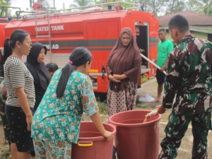 “Kodim 0212/Tapsel Melaksanakan Bhakti TNI AD Penyaluran Air Bersih”