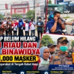 Peduli Kesehatan Warga, PWMOI Riau Bersama Polsek Binawidya Turun ke Jalan Bagikan Masker